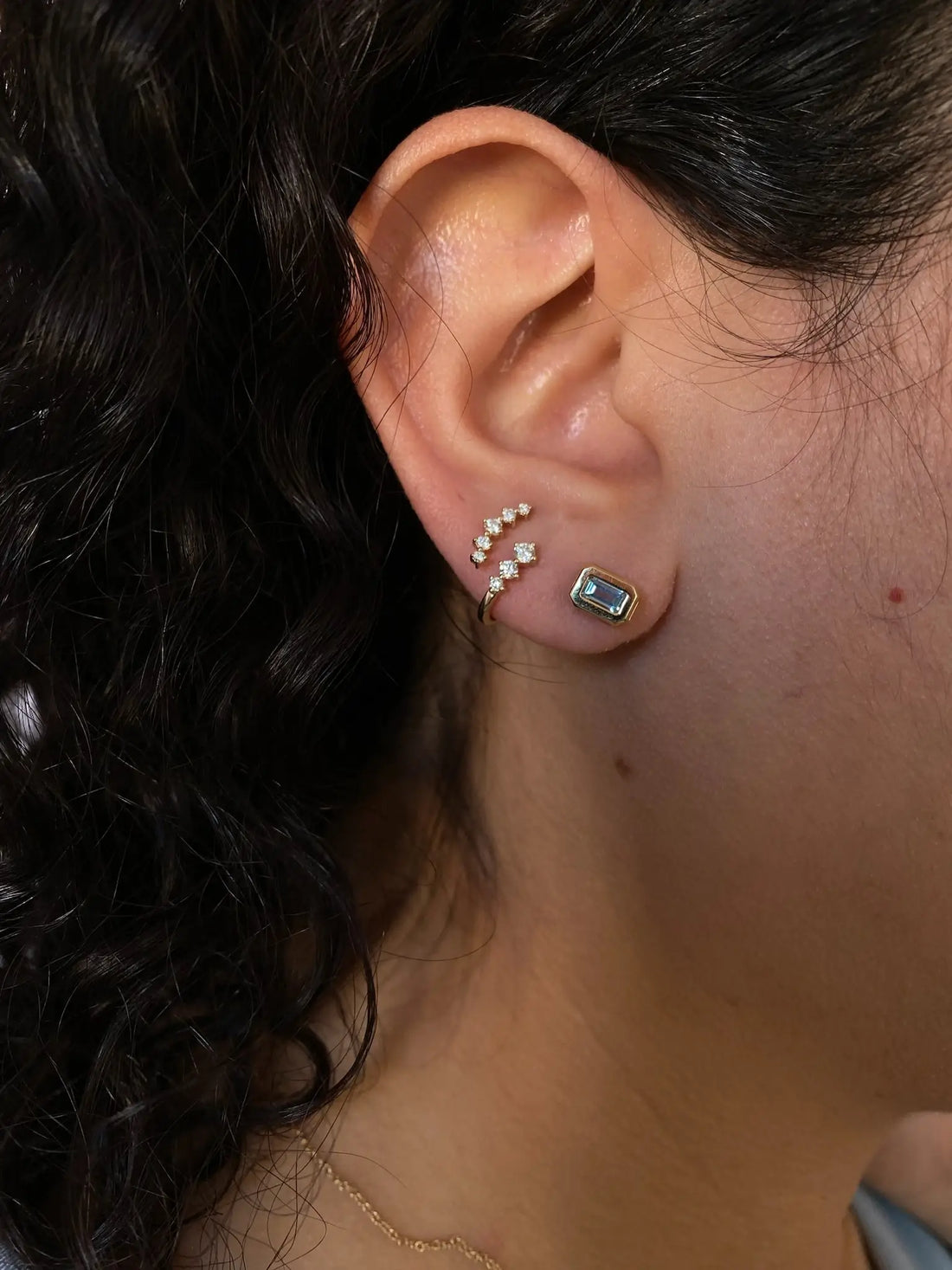 0.20 TCW Emerald Cut Moissanite Bezel Stud Earrings in Gold 2