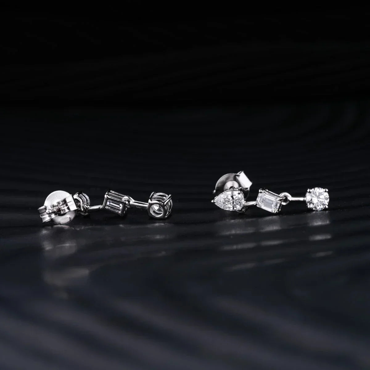 0.83 TCW Round, Pear & Emerald Cut Moissanite Earrings in Gold 2